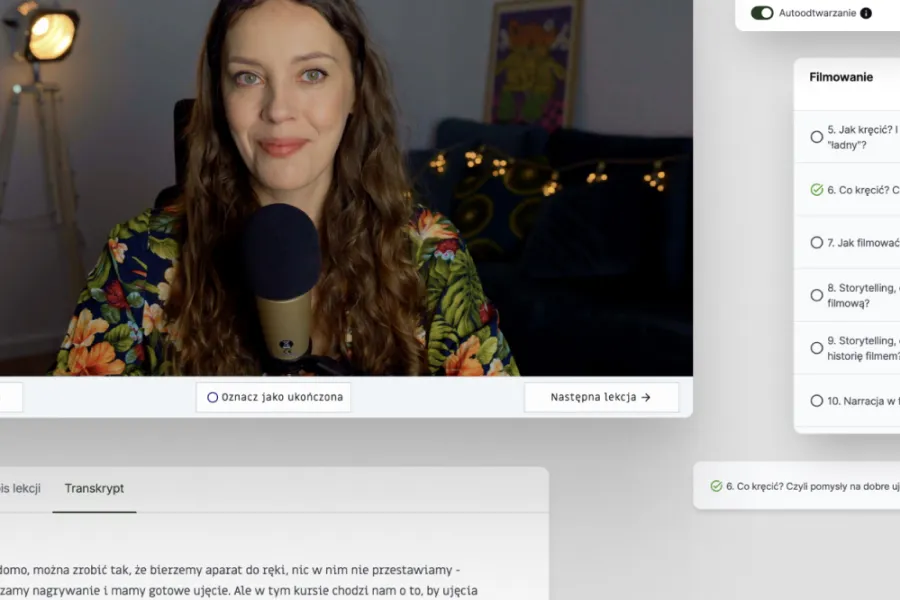 A woman is talking into a microphone on a computer screen.